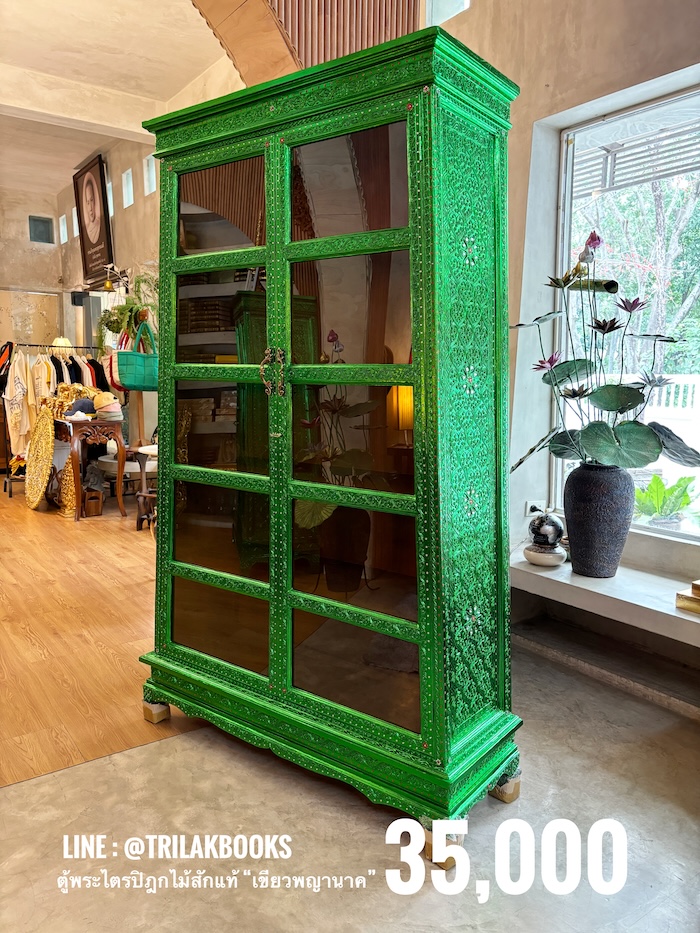 ตู้พระไตรปิฎกไม้สัก สำหรับบรรจุพระไตรปิฎก ภาษาไทย 91 เล่ม ราคาตู้ไม้สัก 35000 บาท 