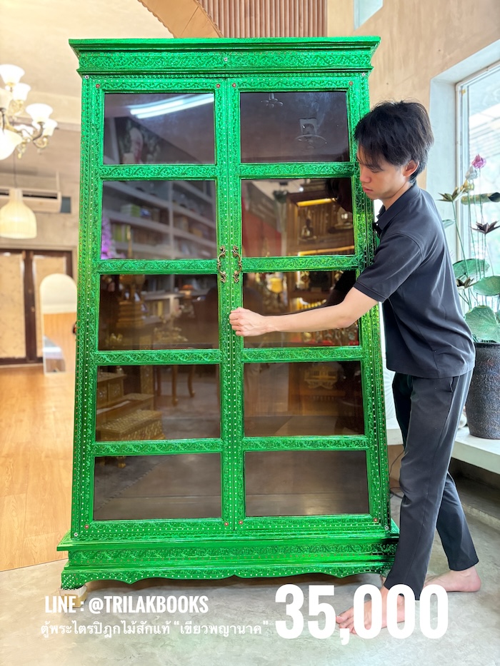 ตู้พระไตรปิฎกไม้สัก สำหรับบรรจุพระไตรปิฎก ภาษาไทย 91 เล่ม ราคาตู้ไม้สัก 35000 บาท 